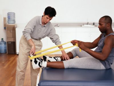 Physical Therapist Helping a Patient